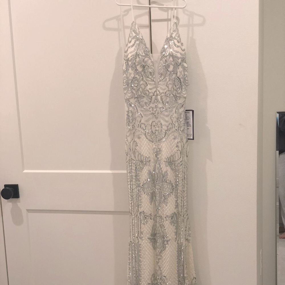 Sequined evening gown. Never worn with tags!